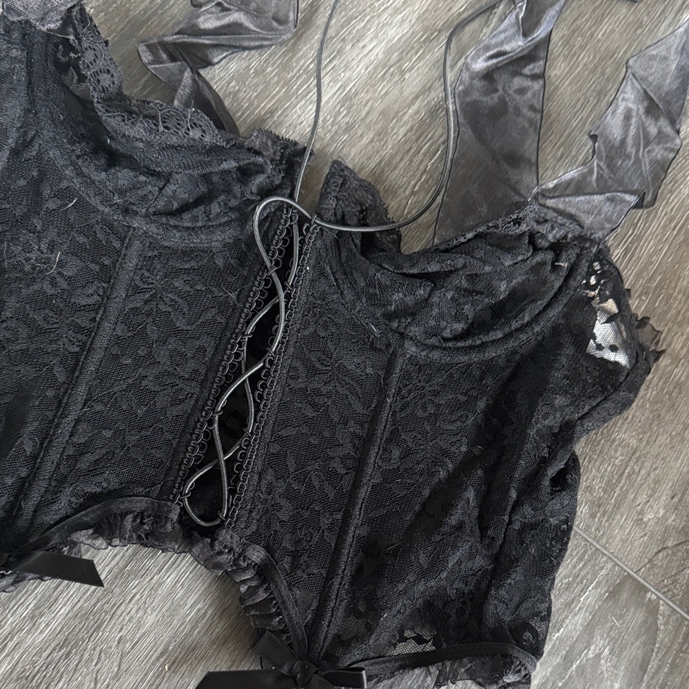 Chic Black Lace Crop Top with Bow Accents - Picture 2 of 3